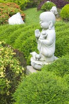 buddha statue in japanese garden