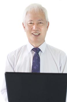 senior asian business man with a laptop
