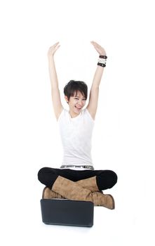 happy young asian girl on a laptop and hand raising up