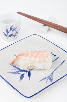 sushi with chopstick