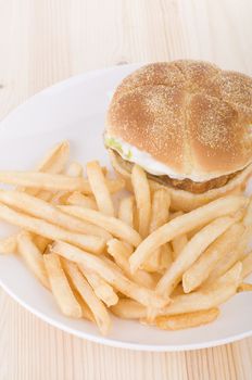 burger and chips food on a table