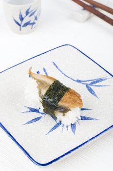 sushi with chopstick and plate