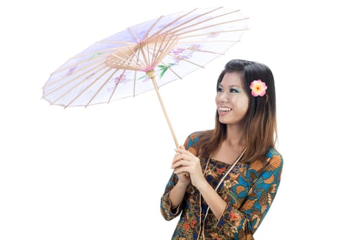 asian girl  in kebaya and umbrella with isolated white background