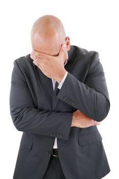 Portrait of a young business man looking depressed from work isolated over white background
