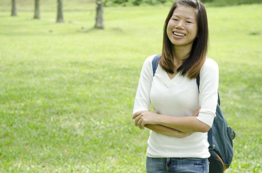 asian girl smiling with green backgrond