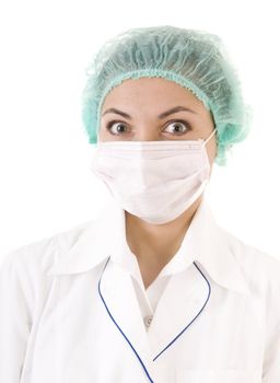 Excited doctor in mask and blue cap isolated on white background