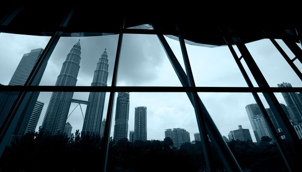 kuala lumpur ,storm is coming view from a framed window