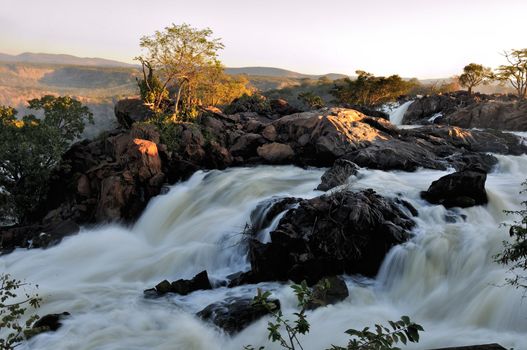 Top of of the Ruacana waterfalls, Namibia at sunset