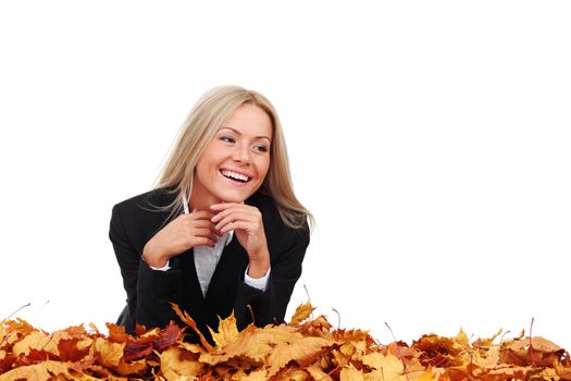 studio portrait of autumn business woman in  yellow leaves