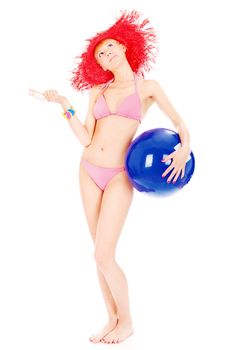Young woman in bikini holding  blue ball, isolated on white background