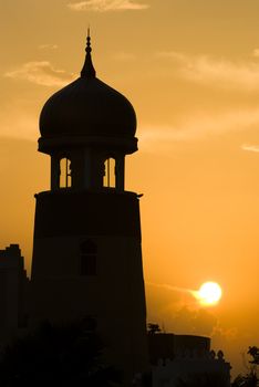 silhouette of a moque during sunset