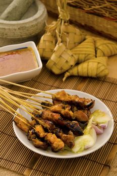 satay and malaysian foods on lowlight setup