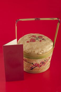 chinese new year basket with red background