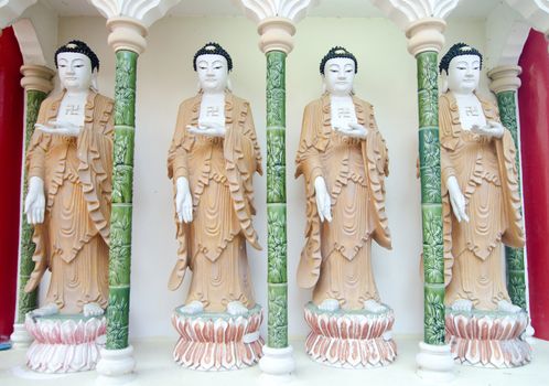 A row of buddhas at Kek Lok Si Temple, Penang, Malaysia 