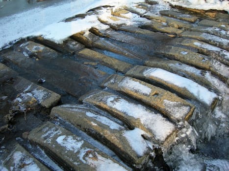           Frozen bridge pattern - the building is covered by ice