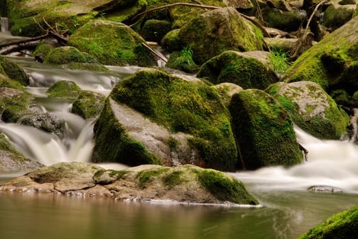  Wild mountain brook with stones and long exposure 