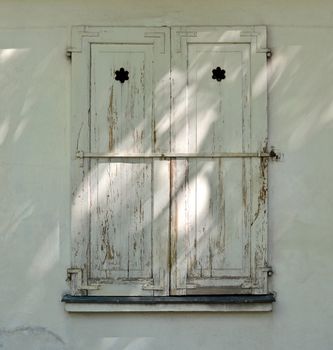 An old wooden closed window