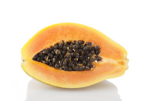 Papaya non white background with shadows visible.