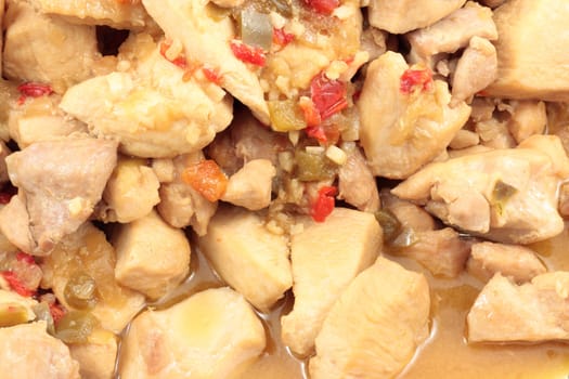 chopped chicken stew in mediterranean sauce of onions and peppers