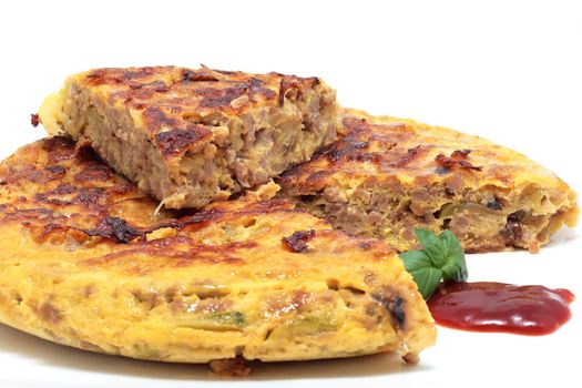 tortilla of minced meat with onion and zucchini isolated
