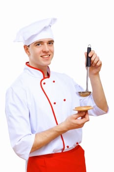 Young cook preparing food wearing a red apron