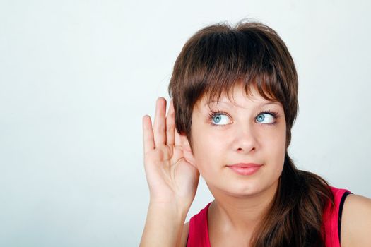 Eavesdropping. portrait of an attractive young teen girl