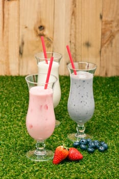 Blueberry, Strawberry and Banana milk shake with fresh fruit