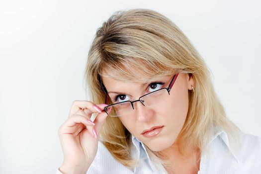Portrait of a business woman blonde in glasses