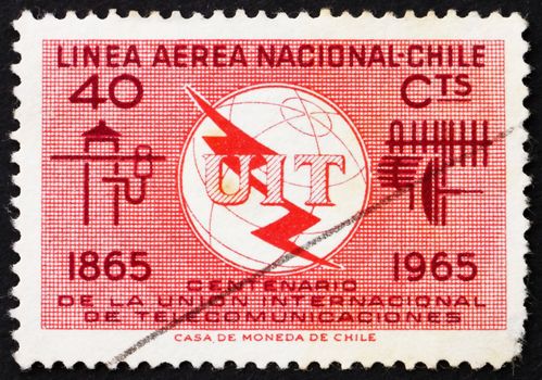 CHILE - CIRCA 1965: a stamp printed in the Chile shows ITU Emblem, Old and New Communication Equipment, circa 1965