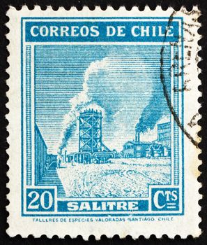 CHILE - CIRCA 1938: a stamp printed in the Chile shows Nitrate Industry, circa 1938