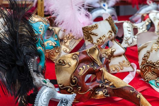 Various Venetian mask on a market stand in Venice.