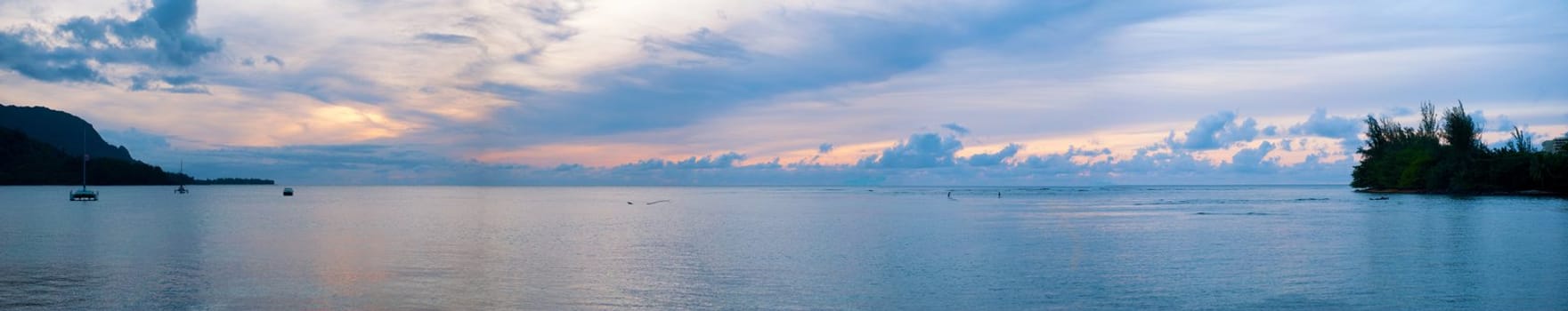 A panoramic shot of Hanalei Bay on the Island of Kauai in Hawaii at sunset