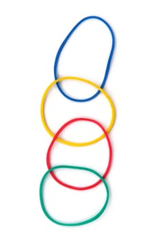 Colorful rubber bands against a white background 