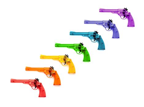 Colorful of plastic guns  for child , on a white background 