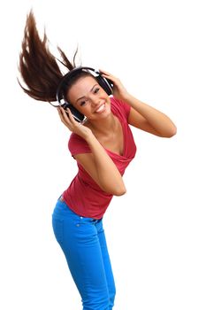 Happy smiling girl dancing and listening to music