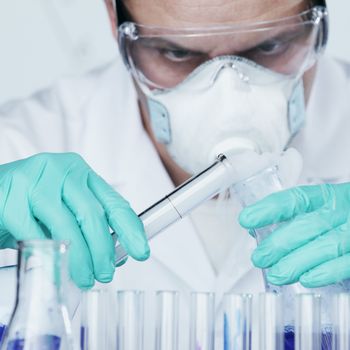 Chemistry Scientist conducting experiments in laboratory
