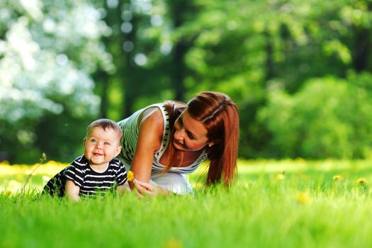 mother and child on grass