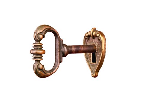 vintage key in keyhole isolated on white background