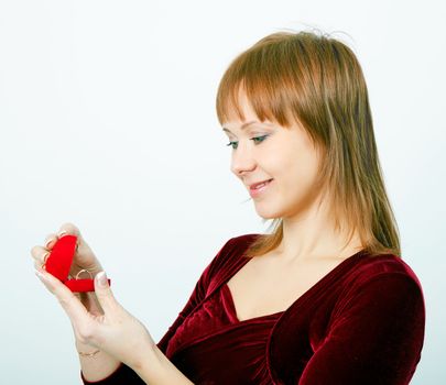 Attractive girl with a box for rings