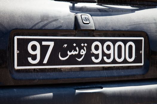 An Tinisian Car Black License Plate