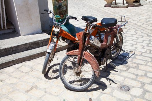 Two old fashioned moped in Djerba - Tunisia -