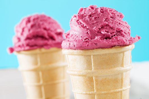 blueberry ice cream in a waffle closeup in front of other