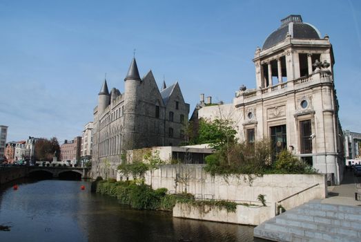 Gravensteen castle reflecting in the river. Gent, Belgium 