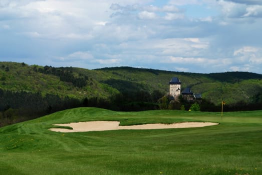 Karlstein Castle, constructed in 1348 in the Bohemia, Czech Republic and golf 