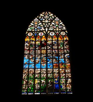 Beautiful stained glass window in the Brussels cathedral isolated on black