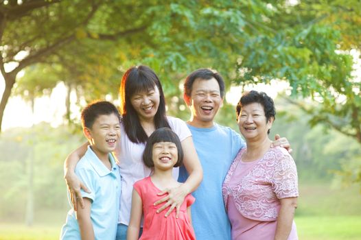 Happy outdoor family having great smile