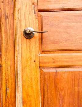 Wooden door with a knob.