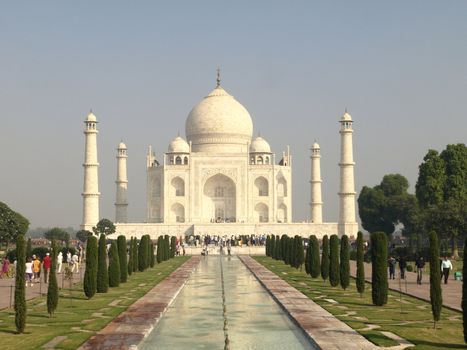 Beautiful white marble of the Taj Mahal seen from entrance gate