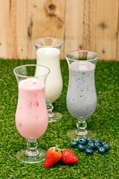 Blueberry, Strawberry and Banana milk shake with fresh fruit