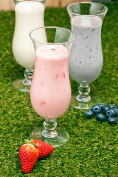 Blueberry, Strawberry and Banana milk shake with fresh fruit